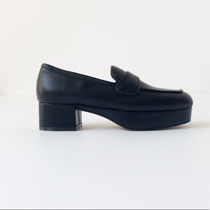 Black platform loafers